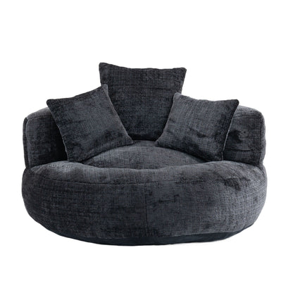 Canapé pouf géant noir en chenille 42.52, pour chambre à coucher, avec trois coussins.